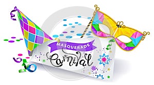 Carnival banner. Colorful carnival mask with colorful feathers, multicolored hat and sheet of paper with the calligraphic inscript photo