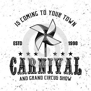 Carnival black emblem with paper windmill toy