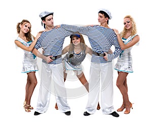 Carnival dancer team dressed as sailors. Isolated on white background in full length.