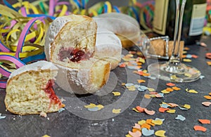 Carnival Donut with carnival decoration on a slate