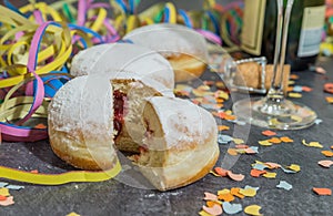 Carnival Donut with carnival decoration on a slate