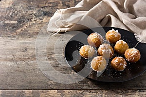 Carnival fritters or buÃÂ±uelos de viento photo