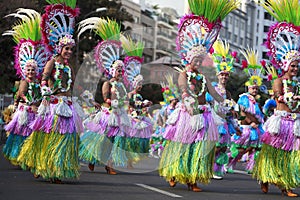 SANTA CRUZ DE TENERIFE, CANARY ISLANDS - circa FEBRUARY 2018: Carnival groups and costumed characters, parade through the streets
