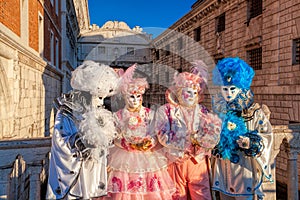 Carnival masks against Bridge of Sighs in Venice, Italy