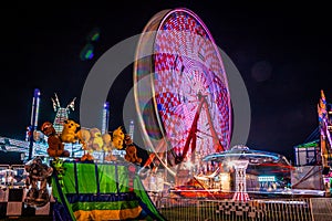 Carnival at night - rides in motion patterned fun lights