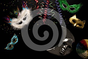 Carnival objects on a black background. Festival begins