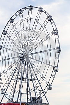 Carnival ride showing a spinning ferris wheel in action