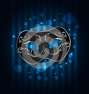 Carnival or theater mask on blue shimmering background