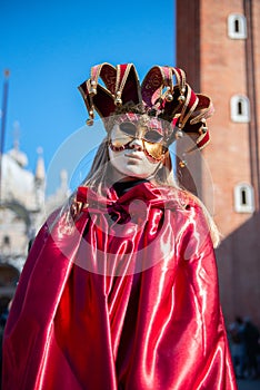 Carnival of Venice. Colorful carnival mask at a traditional festival in Venice, Italy. Beautiful mask at masquerade in Piazza San