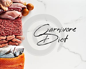 Carnivore diet or low carb diet background concept. Raw animal meat products beef, minced pork and sausages, chicken