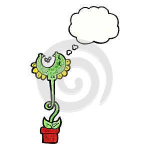 carnivorous flower with thought bubble photo