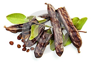 Carob beans. Healthy organic sweet carob pods