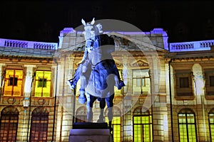 Carol I statue and Central University Library night