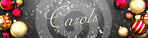 Carols and Christmas,fancy black background card with Christmas ornament balls, snow and an elegant word Carols, 3d illustration