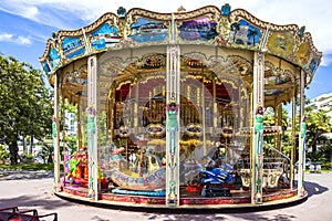 Carousel in Cannes. A classic and colorful old merry go round in Cannes, France