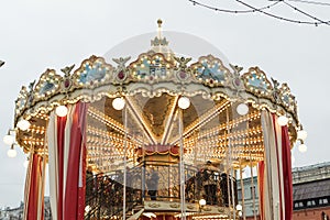 Carousel, folk festivals on the background of the Moscow Kremlin