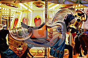 Carousel horse colorful closeup with lights