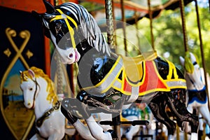 Carousel with Horses on a carnival Merry Go Round