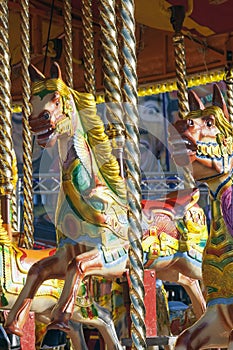 Carousel horses at fairground.