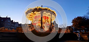 Carousel, illuminated, nightime photo