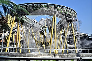 Carousel at the Prater the amusement park in Vienna, from whose structure drops water, on the carousel boat with people go down fa