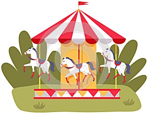 Carousel with three colored horses on playground. Outdoor entertainment for children in park