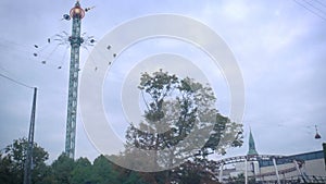 Carousel in Tivoli Gardens Copenhagen Denmark in cloudy day