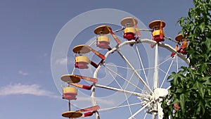 Carousel wheel in a summer day