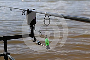 Carp fishing indicator. Warning for fishing, detailed swinger. photo