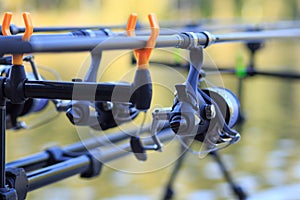 Carp Fishing rods with reel set up on holder