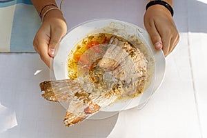 Carp soup traditionally homemade by the locals in the Danube Delta, Romania