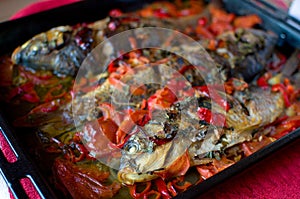 Carp and vegetables stew