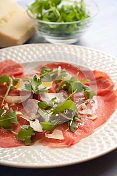 Carpaccio with arugula and parmesan cheese