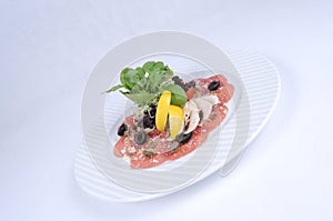 Carpaccio in garlic, parmesan