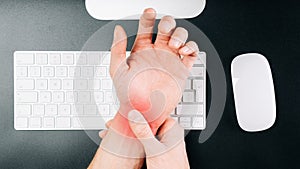 Carpal tunnel syndrome. Hand pain in man injury wrist. Arthritis office syndrome is consequence of computer. Health care