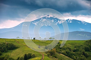 Carpathian alpine valley at stormy weather