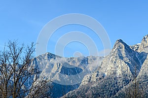 Carpathian mountains, Bucegi with Caraiman Peak, clouds, snow