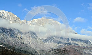 Carpathian mountains, Bucegi with Cross in top of Caraiman Peak