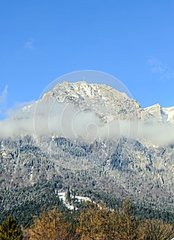 Carpathian mountains, Bucegi with Cross in top of Caraiman Peak