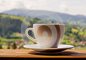 Carpathian mountains with coffee still life