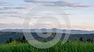 Carpathian mountains summer landscape with blue sky and clouds. Panoramic view. photo