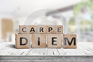 Carpe diem seize the day sign on a table