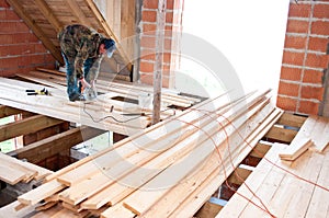 Carpenter building new floor