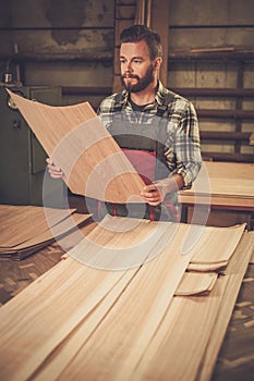 Carpenter doing his job in carpentry.