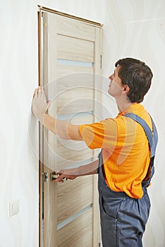 Carpenter at door installation