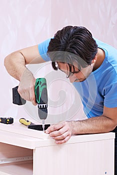 Carpenter with drill