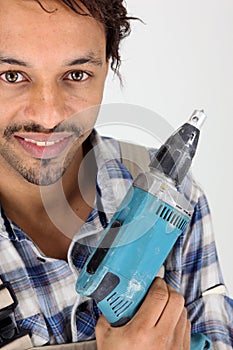 Carpenter with electric drill