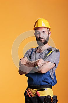 Carpenter expert holding sledgehammer on camera