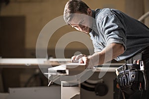 Carpenter focused on his work photo