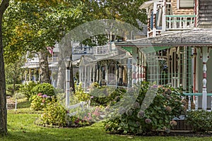 Carpenter Gothic Cottages with Victorian style, gingerbread trim in Wesleyan Grove, town of Oak Bluffs on Martha`s Vineyard,